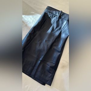 Navy Size 2 Faux leather mini skirt. New with tags